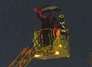 Protester Climbs Big Ben Tower with Palestinian Flag protester-climbs-big-ben-tower-with-palestinian-flag